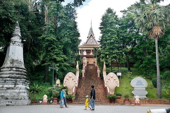 Classic Phnom Penh City Full Day Tour - Wat Phnom: stairs, prayers, and a legend you can feel