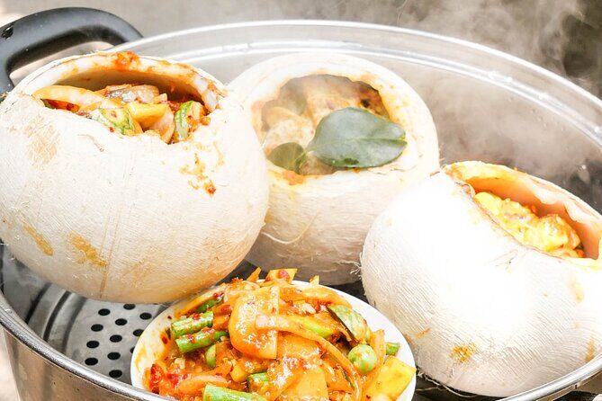 Cooking Class in Phnom Penh - 5:00 PM meetup: coconut water, seasonal fruit, and learning local spices