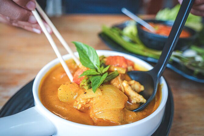 Discover the Tastes Temples and Tales of Authentic Cambodia - Street art and a cooking class with fish amok and chef Nary