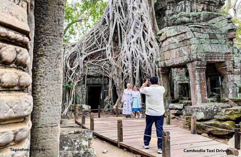 From Phnom Penh: Angkor Wat, Bayon, and Ta Prohm Day Trip - Ta Prohm: the Tomb Raider temple where the jungle writes the script