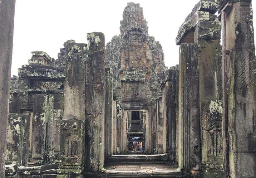 From Phnom Penh: Angkor Wat, Bayon, and Ta Prohm Day Trip - Angkor Wat at first light: five towers, two religions, and huge scale