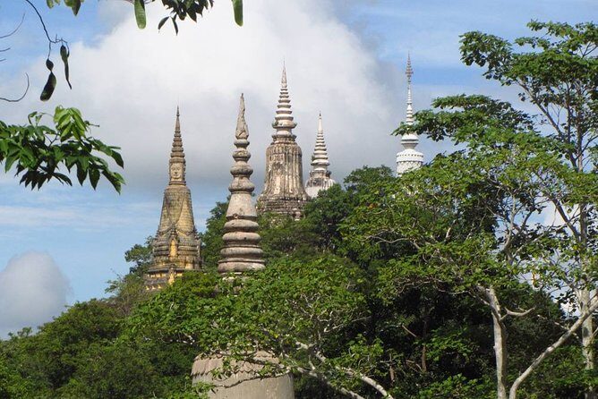 Full-Day Discover Oudong Mountain-Former Capital City & Phnom Penh City Tours - Getting to Oudong Mountain: Pickup, AC Ride, and Cooling Touches