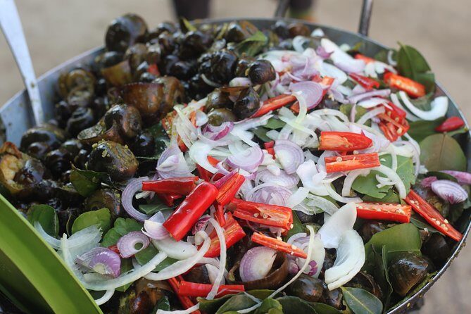 Oudong Mountain And Floating Village Cycle Tour - Khmer lunch and fresh fruit fuel for the climb