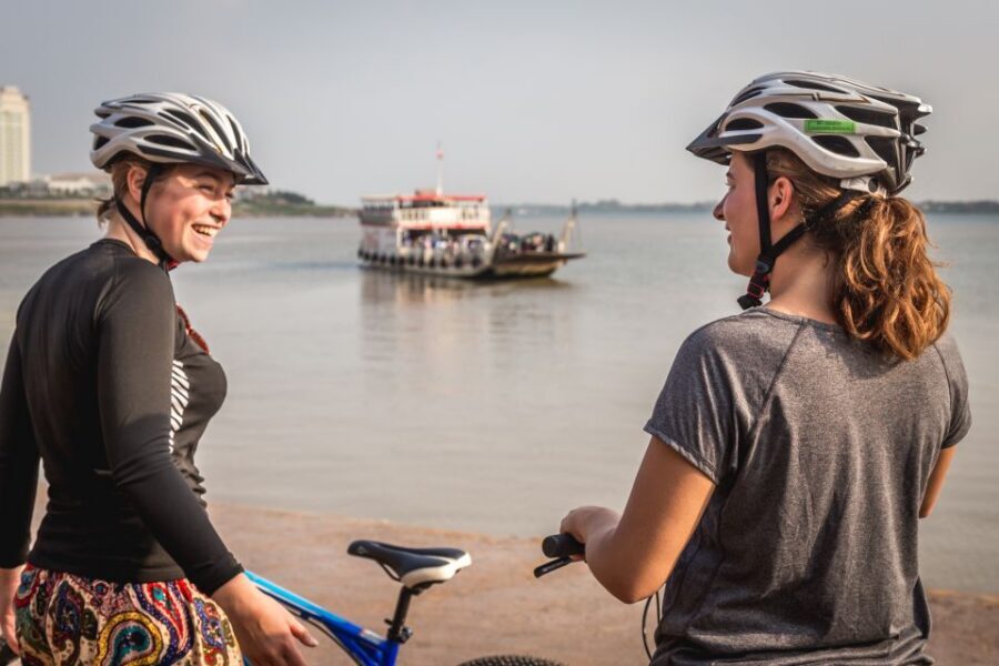 Phnom Penh: Mekong Islands & Silk Islands Guided Bike Tour - Crossing back to Phnom Penh and finishing with Khmer lunch