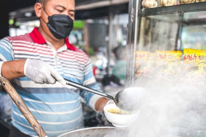 Phnom Penh Night City Highlights & Local Food tour by Tuktuk - Russian Market dessert time: Cambodian sweet snacks on a street-food mission