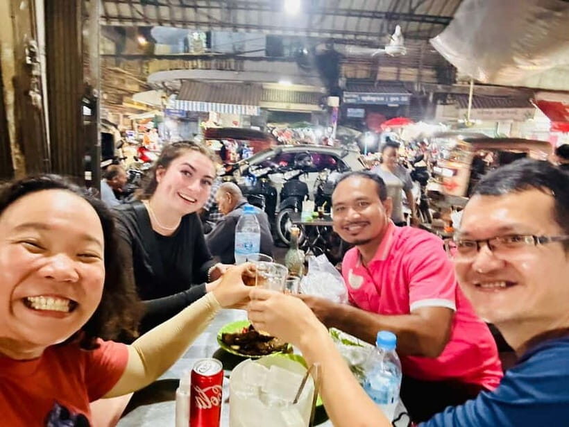 Phnom Penh: Street Art and Food Tour with Pickup and Beer - Spring rolls at the Night Market: where the energy lives