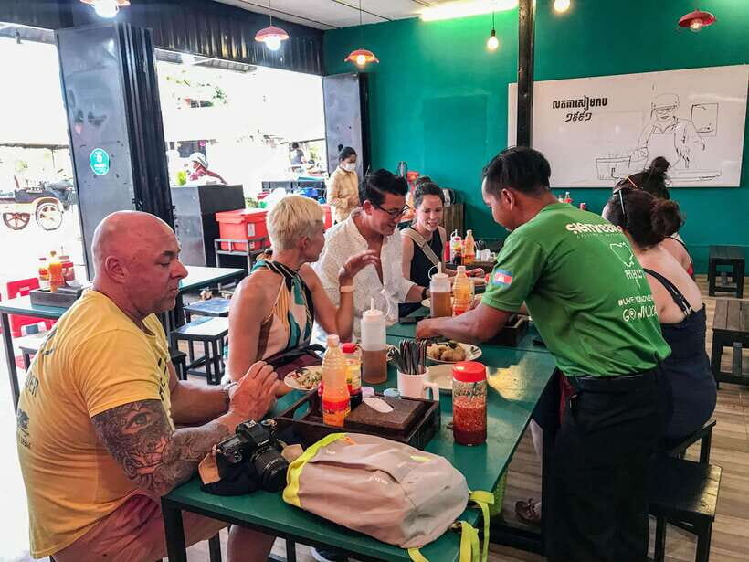 Phnom Penh: Street Art & Food Tour by Tuk-Tuk - Wat Botum Park lunch and banh chaev: the flavor lesson you’ll remember