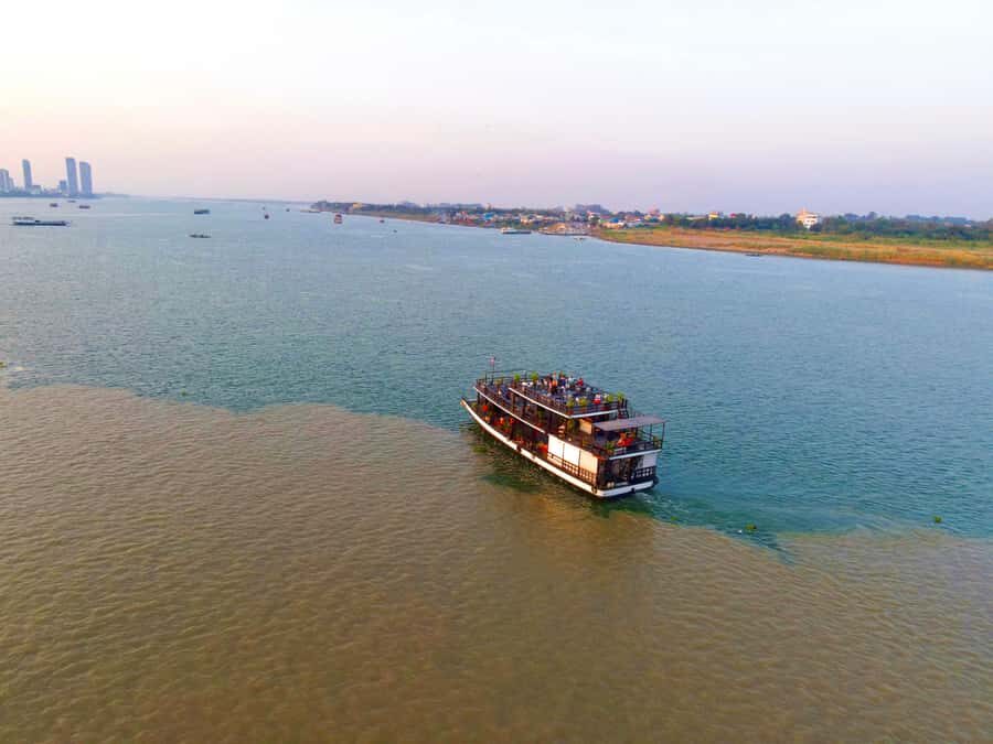 Phnom Penh: Sunset Cruise with Unlimited Beer &Fruit platter - The river route: bridges, temples, and the Royal Palace area from the water