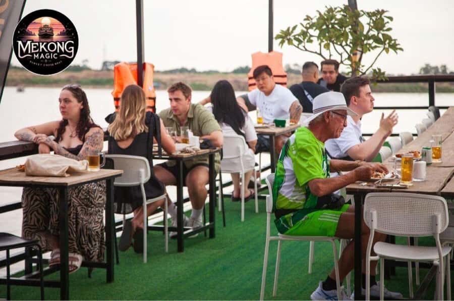Phnom Penh: Sunset Cruise with Unlimited Beers & BBQ Buffet - The River Views: Diamond Island, Stiltside Homes, and City Light Photos
