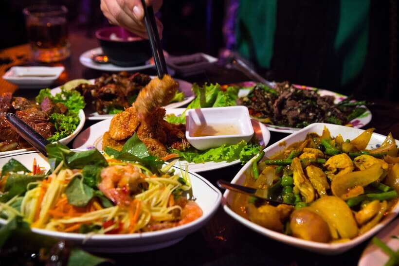Phnom Penh's Ultimate Street Food Tour by Tuk Tuk - Stop 1: Royal Palace area starter bites (and an easy first beer)