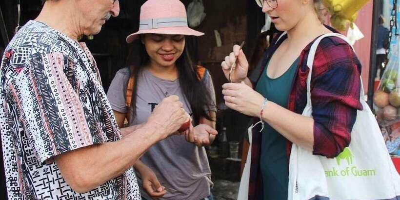 Phnom Penh's Ultimate Street Food Tour by Tuk Tuk - Stop 2: Botumvatey Pagoda snacks and Khmer street classics